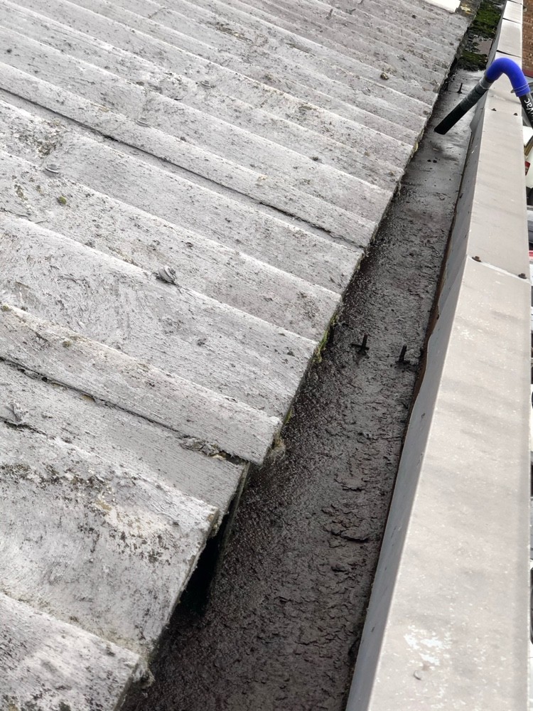 Commercial gutter cleaning preventing leaks and water damage